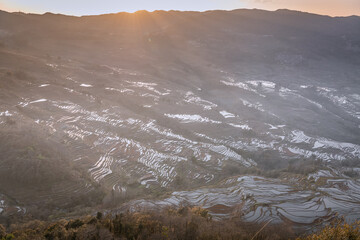 Sunset over YuanYang rice terraces in Yunnan, China
