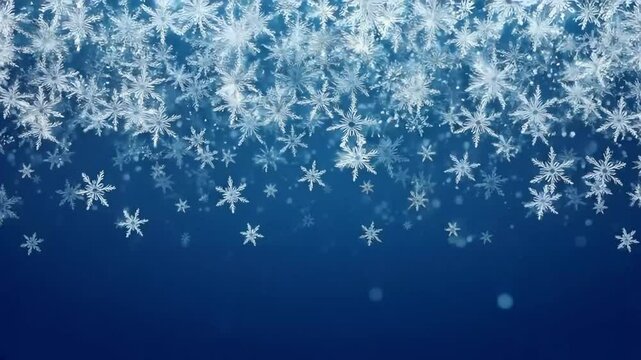 A beautiful winter scene featuring numerous intricate snowflakes falling against a deep blue backdrop.