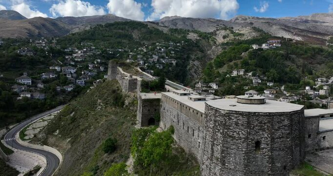 Flying Castle of Gjirokastra Over Valley In Rruga Elvia Celebi, Gjirokast&euml;r, Albania. Aerial Drone Shot