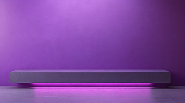 A purple wall with a grey bench in front of it. The bench is empty and the wall is a deep shade of purple. The room has a modern and minimalist feel to it, with the purple wall