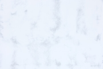 Skim coat on concrete wall for flat smooth surface. Construction work to plaster or apply white compound mortar cement material on surface for repair, improvement. Suit for texture background.