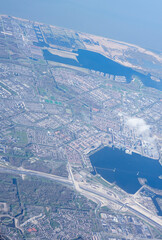 Netherlands, Holland, Dutch, Aerial view of city outskirts in the day from an aeroplane window