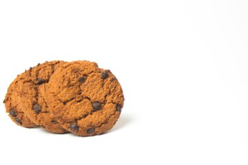 cookies with chocolate topping isolated on white background. oatmeal, free space food.