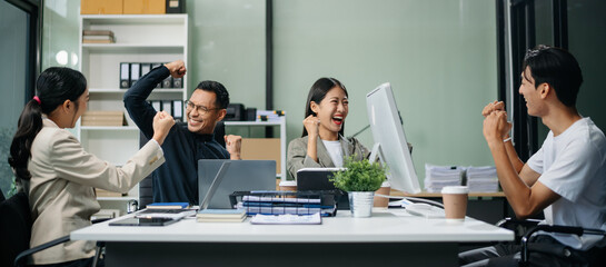 Group of Asian business meeting in planning design in creative business discussing work