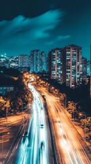 Fototapeta premium Night cityscape with bright lights, traffic, and high rise buildings.