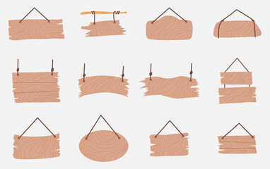 Collection of various rustic wooden hanging signs.