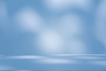 Wall interior background, studio and backdrops show products. with soft light shadow from window color blue and white. background for text insertion and presentation of product	