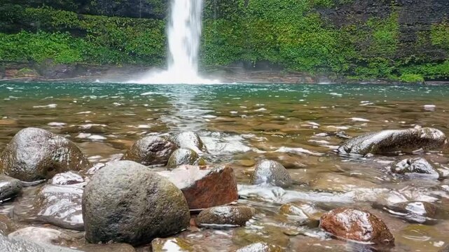 the flow of water in an Indonesian waterfall called Curug Ceheng