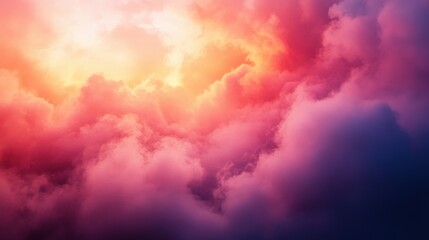 Obraz premium A stunning cloudscape with vibrant hues of pink, orange, and purple, creating a dramatic sky illuminated by sunlight.