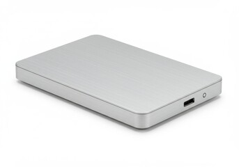 A silver external hard drive is displayed on a white surface in a studio setting for product photography