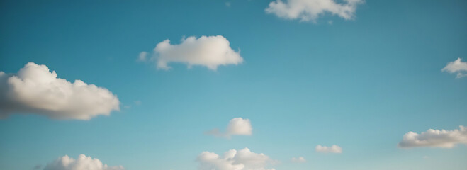 Azure Canopy: Capture the ethereal beauty of a tranquil sky, dotted with fluffy clouds, and let the serene ambiance transport you to a world of peace and wonder.