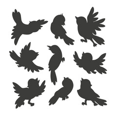 Birds. Set of black isolated hand drawn silhouettes of cartoon birds flying, sitting, chirping, with spread and folded wings. Graphic elements from Signs of Spring collection for nature design
