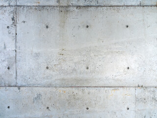 Concrete wall building construction abstract background. Tadao Ando's style concrete wall pattern and texture design. Horizontal grunge square frame concrete panels wallpaper. © tete_escape
