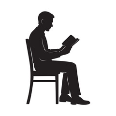 silhouette of a man sitting on a chair reading a book