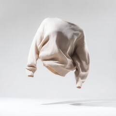 Cream-colored sweater, seemingly floating in studio setting.