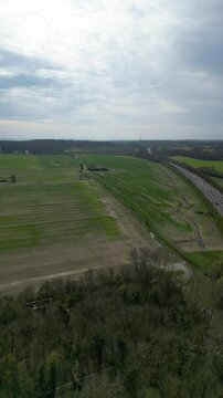 High Angle Footage of Countryside Landscape at Village of Coventry City of England United Kingdom. Aerial View Was Captured with Drone's Camera During Clear Sunny Day of March 30th, 2024