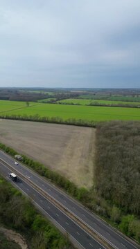 High Angle Footage of Countryside Landscape at Village of Coventry City of England United Kingdom. Aerial View Was Captured with Drone's Camera During Clear Sunny Day of March 30th, 2024