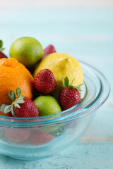 assorted fresh fruits on clear glass bowl 
