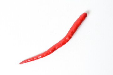 Top view of one (1) fresh red chili pepper isolated on white background. Clipping path.