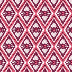 A seamless diamond-shaped ikat pattern featuring stylized hearts and intricate geometric details. The rich pink, red, and white color scheme, Perfect for Valentine’s Day-themed designs.
