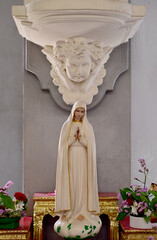 Close up of Statue of Our lady of grace virgin Mary in the church, Thailand. selective focus.