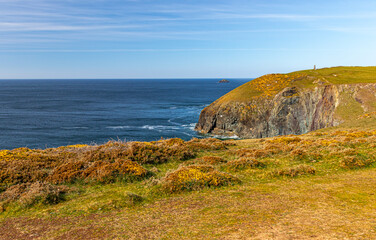 Landscape on a sunny April day. Beautiful view of the mountains and ocean. Padstow Cornwall, UK.