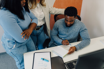 Business team collaborating on project, brainstorming new ideas
