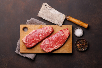 Raw marbled striploin steak, fresh, rich, ready for cooking
