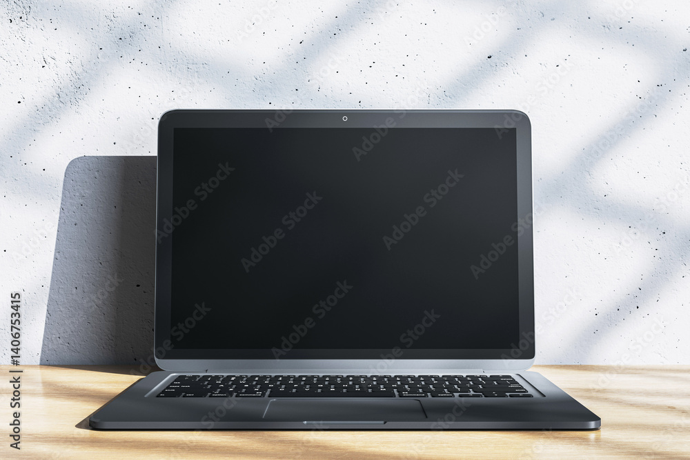 Leinwandbilder blank laptop screen mockup on wooden table with light shadows on white textured wall background for 