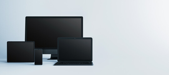 Digital device mockup layout with monitor, laptop, tablet and smartphone on clean light background for modern interface presentation template. 3D Rendering