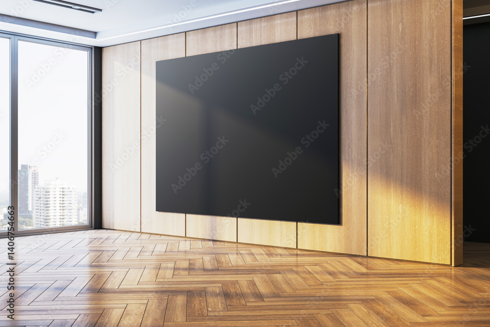 Poster blank black canvas on wooden wall in modern office interior with parquet floor and large window show