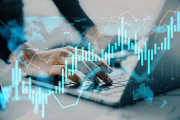 Businessperson analyzing financial data on laptop with global stock market chart overlay on light background in modern business technology concept.
