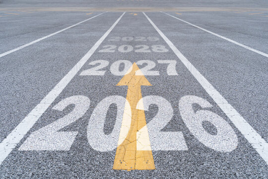New year 2025 or straight forward concept. Text 2026, 2027, 2028, 2029 written on the road.