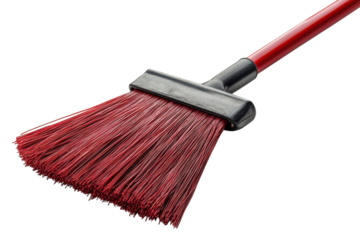 Broom with a red handle and bristles ready for cleaning tasks indoors or outdoors