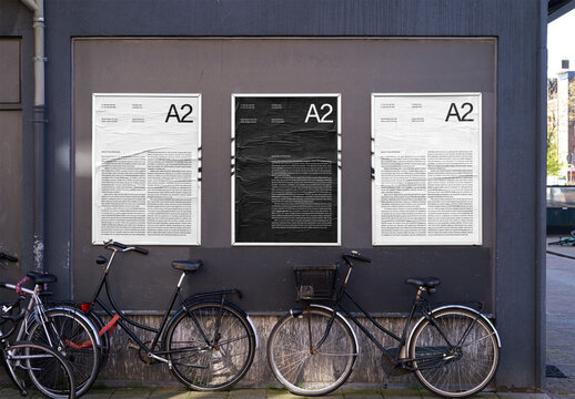 Mockup Of Three Vertical Customized A2 Posters On Building