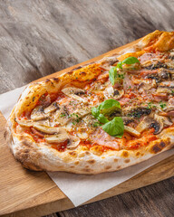 Rustic Mushroom Pizza with Tomato Sauce on a Wooden Board
