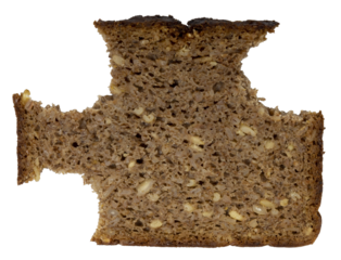 Isolated bitten rye artisan bread on white background