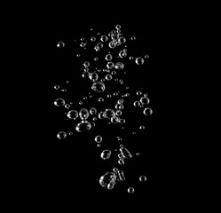 White bubbles, liquid, black background, abstract isolated, oxygen design concept, underwater,...