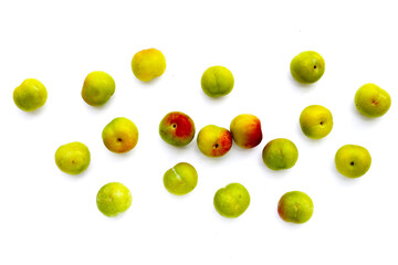 Fresh green plum on white background