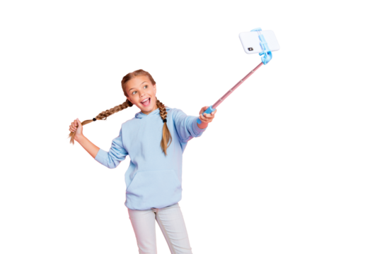 Photo of pretty little lady holding metal stick mono pod making selfies for youth famous blog wear casual blue hoodie pullover isolated pastel pink color background