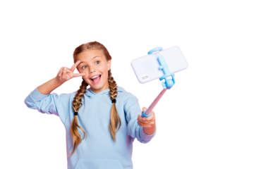 Photo of casual cheerful excited cute blonde girl wearing blue sweater taking selfie using self stick at leisure isolated over pink pastel color background