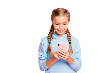 Photo of pretty little lady holding telephone hands reading positive comments for new post wear casual blue hoodie pullover isolated pastel pink color background