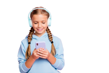 Photo of pretty little lady holding telephone hands turning on new popular youth song in earflaps wear casual blue hoodie pullover isolated pastel pink color background