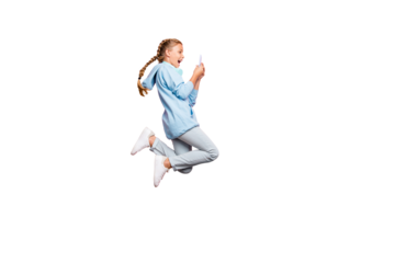 Full length body size photo of excited crazy ecstatic schoolchild browsing through phone jumping wearing blue sweatshirt sweater sportive wear jeans denim isolated over pink pastel color background
