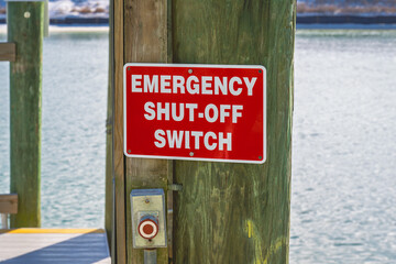 Emergency shut off switch and sign