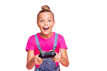 Photo of rejoicing cute nice schoolgirl excited about level complete playing video games wearing t-shirt jeans denim holding joystick with her hands isolated over pink pastel color background