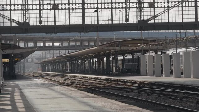 Almost empty train platform at Paris Austerlitz under renovation in soft daylight