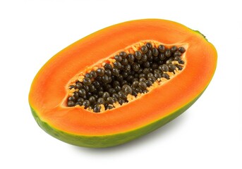 A halved papaya with orange flesh and black seeds isolated on a white background in close up view