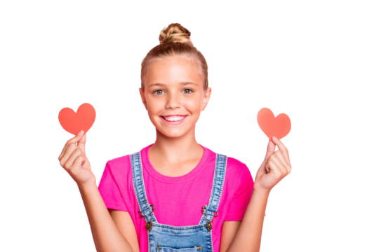 Photo of cheerful cute nice schoolgirl holding two red heart shapes with hands wearing fuchsia t-shirt isolated over pastel color background - Powered by Adobe