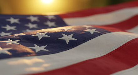 Close-up of American Flag Waves on Sunset Background  